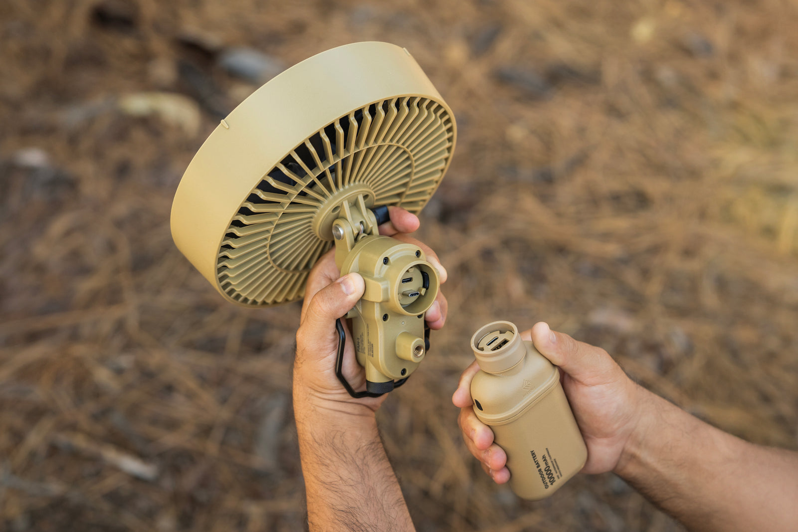 Fan accessory is being attached to the 10000mAh battery.