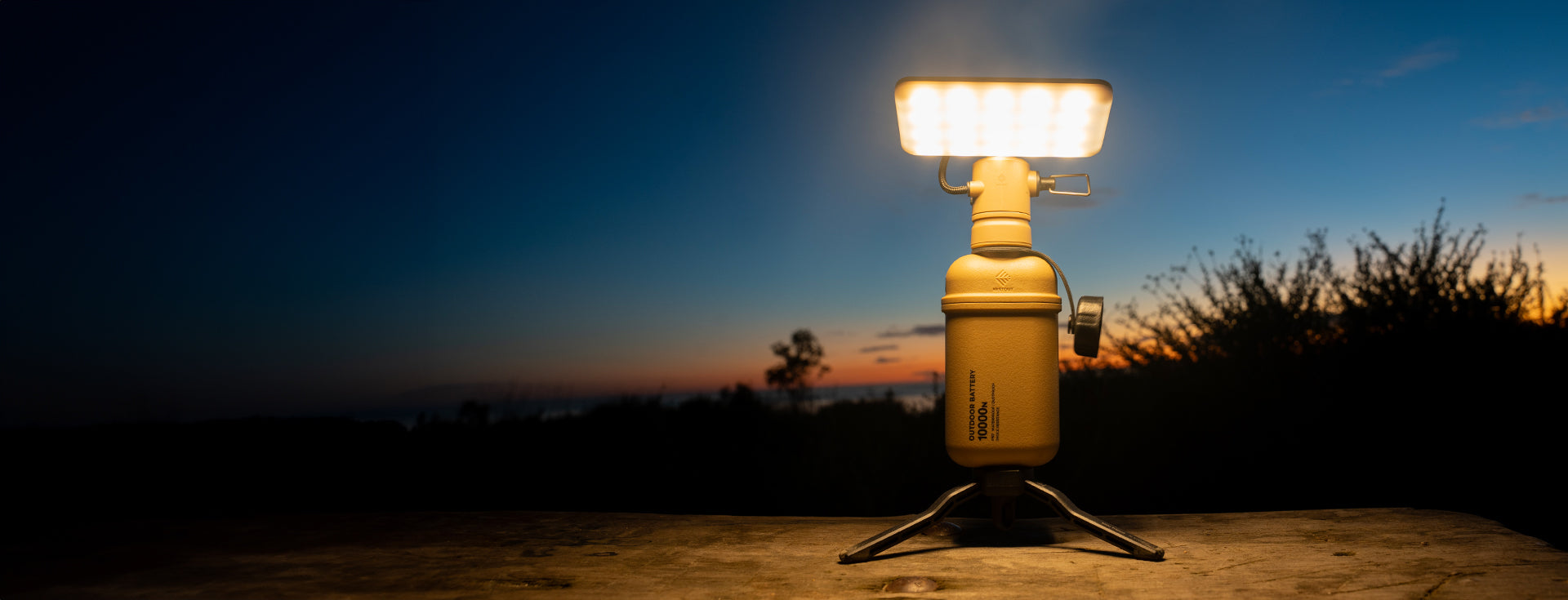 Outdoor 10k power bank on a tripod with flash attachment outdoors 