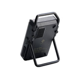 Black portable CO2 detection device using its support stand on a white background