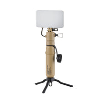 Image of the nestout beige flash connected to the 5k battery standing on tripod