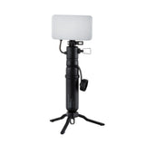 Image of the nestout black flash connected to the 5k battery standing on tripod