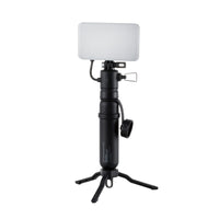 Image of the nestout black flash connected to the 5k battery standing on tripod