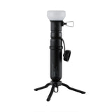 Image of nestout black lamp with connected spacer connected 5k battery and tripod attached