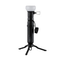 Image of nestout black lamp with connected spacer connected 5k battery and tripod attached