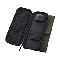 image of the nestout olive green 2 solar panel unfolded inside pocket with USB connector