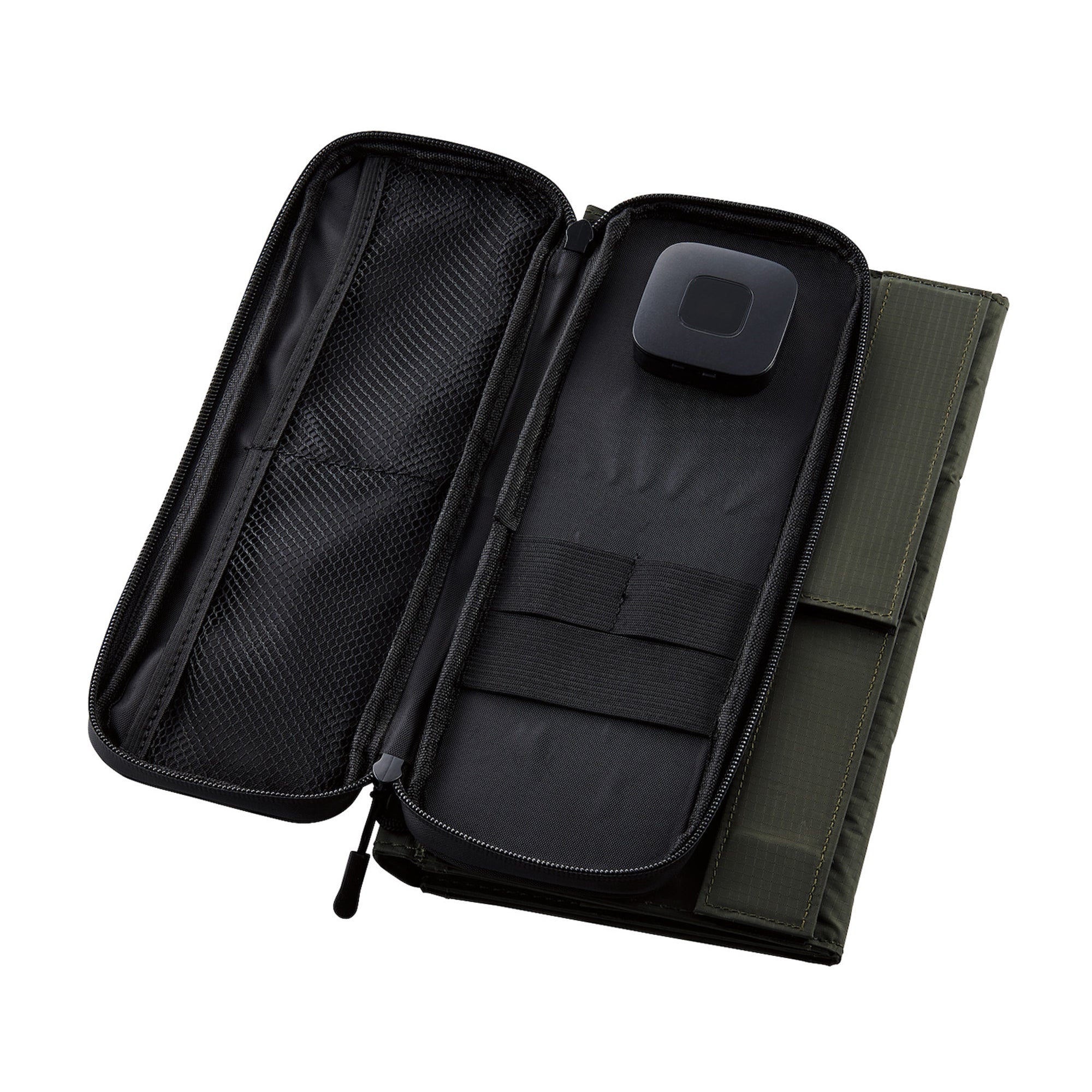 image of the nestout olive green 4 solar panel unfolded inside pocket with USB connector