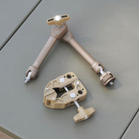 Displaying the two components of the beige clamp arm which include the adjustable arm and clamp