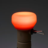 lamp attachment with orange filter placed on it