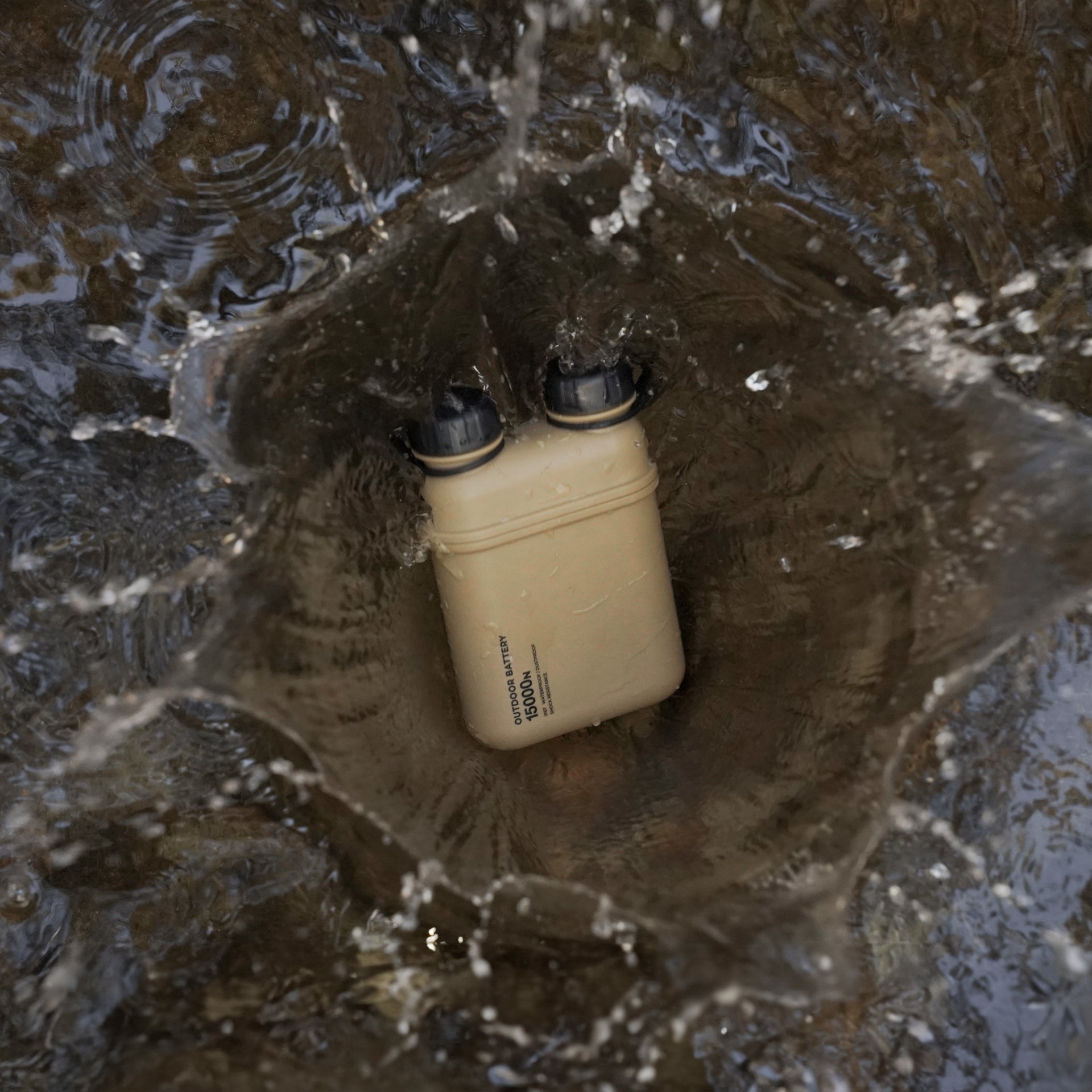 Outdoor 15000mAh battery falling into water.