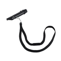 NESTOUT whistle light shown with black lanyard attached on a white background 
