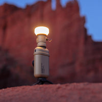 NESTOUT 10000mAh power bank connected to NESTOUT lamp in the Arizona cliffs 