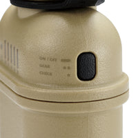 Close up of the on/off button and battery level indicator light on the beige colored 10000mAh power bank