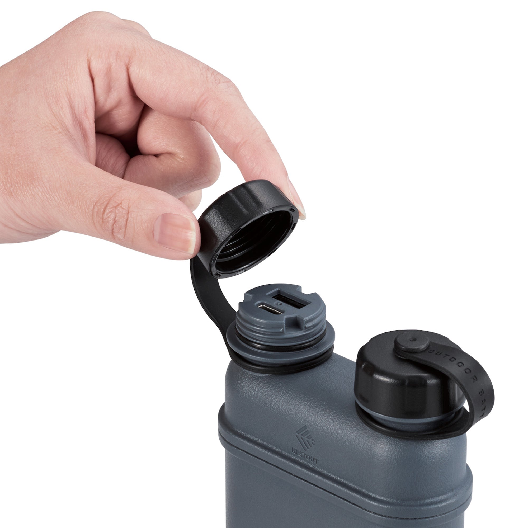 image of hand opening cap of nestout 15k grey colored cylinder battery pack with military IP67 rating | stores up to 15000N of power | rugged waterproof design | compact size | versatile charging | to be used with NESTOUT solar panels, fans, lamps, and flashes